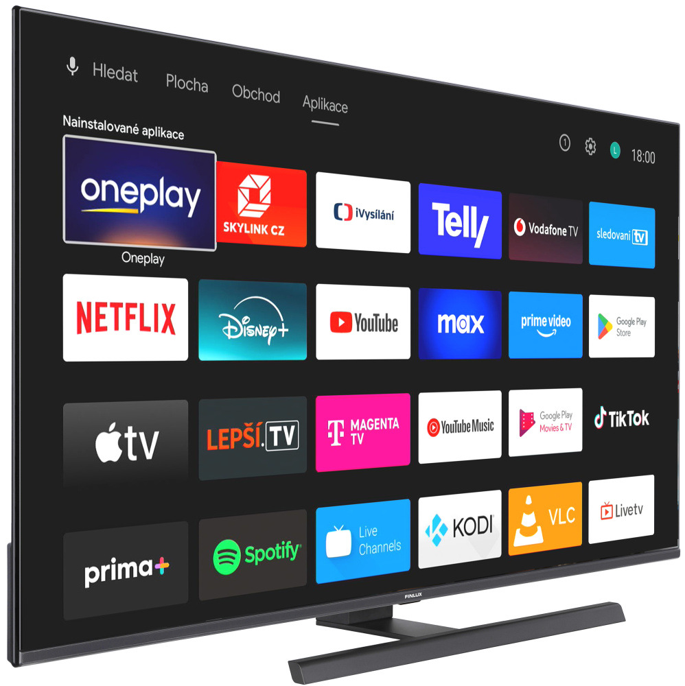 Televize Finlux 32FQI8071 natočená mírně doprava, na obrazovce televize je výčet aplikací