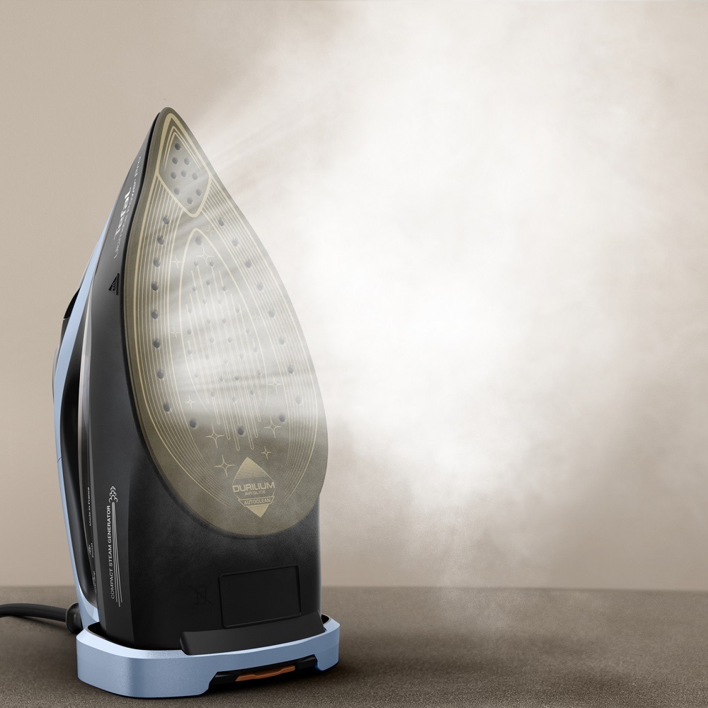Žehlička Tefal Ultimate Power Pro FV9E53E0 černá/modrá Postavená žehlička Tefal FV9E53E0 Ultimate Power Pro produkující páru