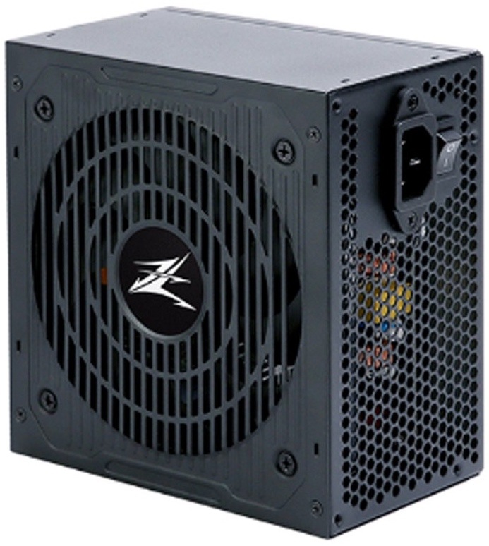 Na fotce je počítačový napájecí zdroj Zalman MegaMax ZM600-TXII 600W  vyfotografovaný šikmo zepředu. Na levé straně je velký černý ventilátor krytý pevnou mřížkou s logem Zalman uprostřed. Pravá boční strana je perforovaná a obsahuje zásuvku pro napájecí kabel a malý vypínač. Skrz boční mřížku jsou částečně vidět barevné vnitřní součástky.