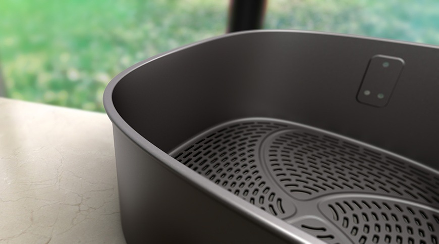 Fritéza horkovzdušná Philips Airfryer Dual Basket 4000 series 10 l, NA461/00 černá Detailní záběr na část nepřilnavé části u horkovzdušné fritézy značky Philips.