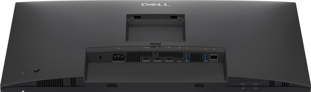 Horní pohled na zadní část šedého monitoru Dell s odpojeným stojanem. V zapuštěném panelu jsou napájecí konektor, HDMI, dva konektory DisplayPort, USB-C, dva porty USB-A a síťový port RJ-45. Další dva porty USB-C jsou na spodní hraně.