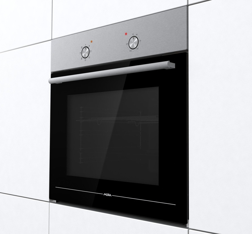 Vestavná trouba Mora VT 221 GX je zabudovaná do kuchyňské skříně.