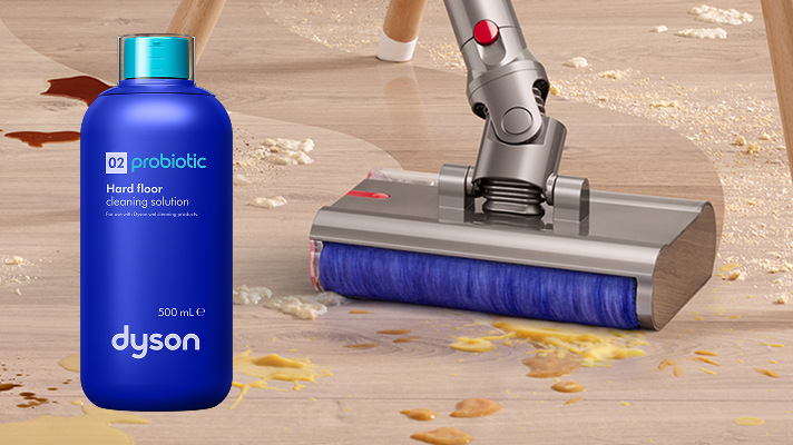 Tyčový vysavač Dyson V12s Detect Slim Submarine + sada pro detailní úklid stříbrný Vysavač V12s Detect Slim Submarine vedle probiotického čisticího přípravku