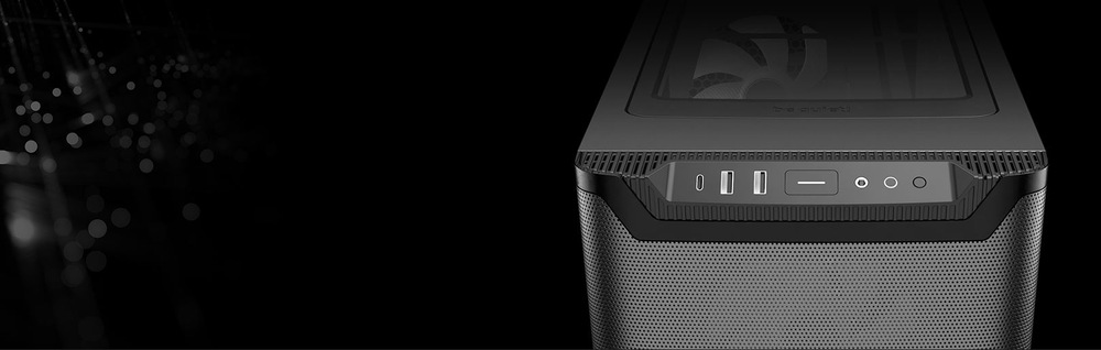 Na tmavém pozadí je zobrazena elegantní počítačová skříň. Na jejím předním panelu jsou USB porty a tlačítka, což naznačuje moderní hi-tech design.