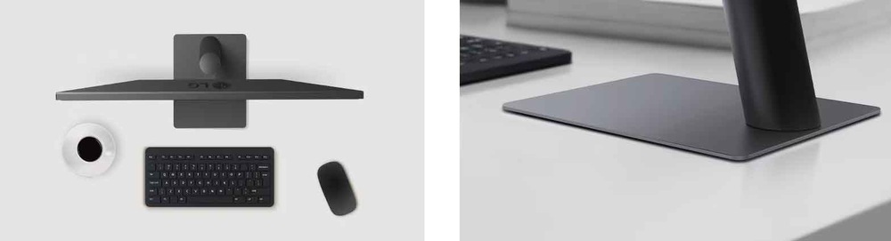 Elegantní, minimalistické pracovní prostředí s monitorem, bezdrátovou klávesnicí, myší a šálkem kávy.