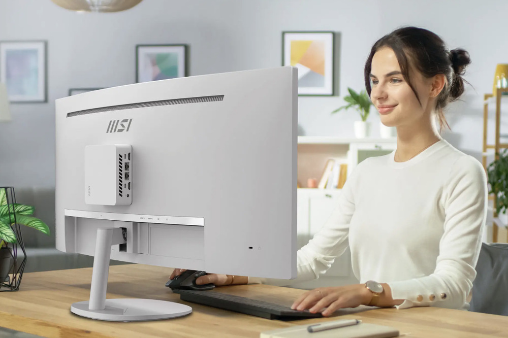 Monitor MSI PRO MP341CQW E12 bílý Zadní strana monitoru MSI PRO MP341CQW E12 s připevněným mini PC a stojanem