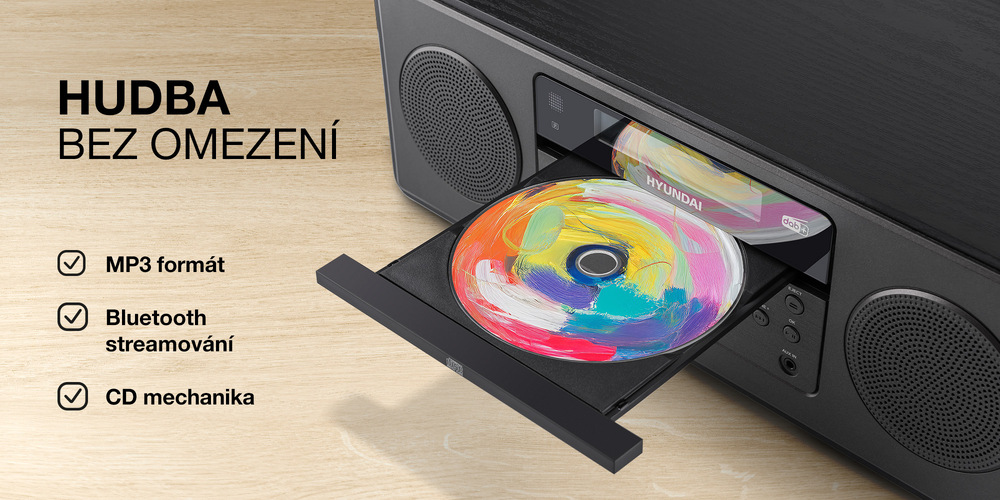 Produktový banner audiosystému Hyundai MSD505DAB etailem na vysunutou CD mechaniku s barevným diskem. Obsahuje výčet funkcí: podpora MP3 formátu, Bluetooth streamování a CD mechanika. Text v obrázku: HUDBA BEZ OMEZENÍ