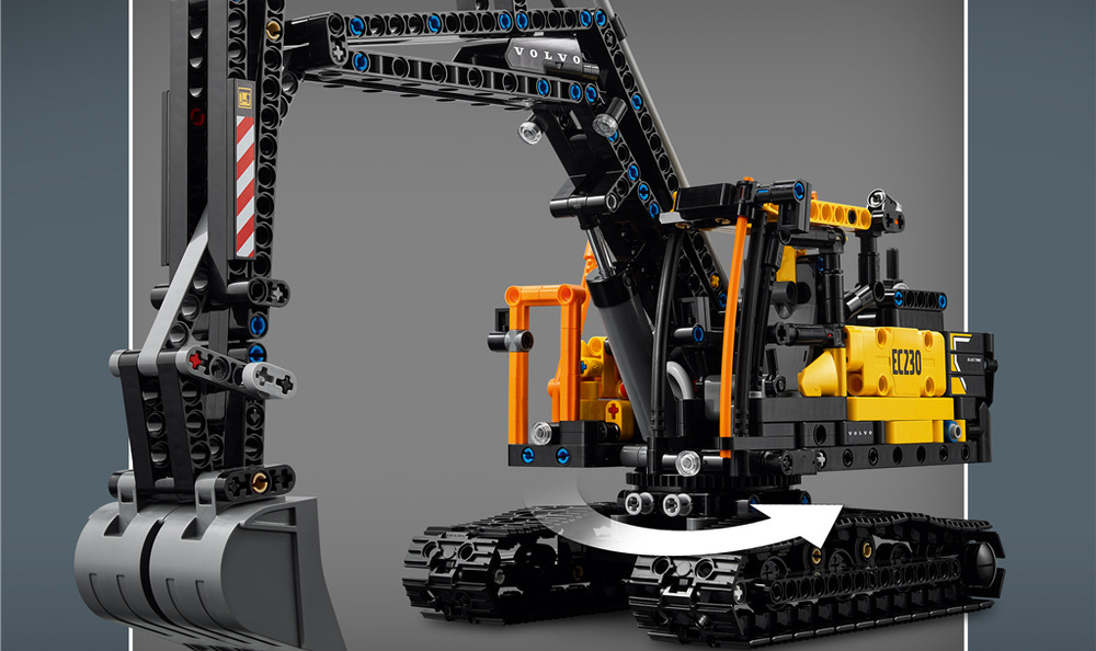 Volvo FMX s plochou korbou a rampou umožňuje přepravit elektrický bagr na staveniště a odhalit funkční motor.