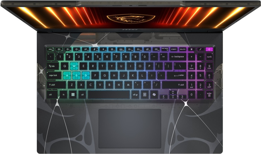 Pohled shora na klávesnici notebooku MSI Cyborg 15 B13W s RGB podsvícením, numerickou částí a velkým touchpadem