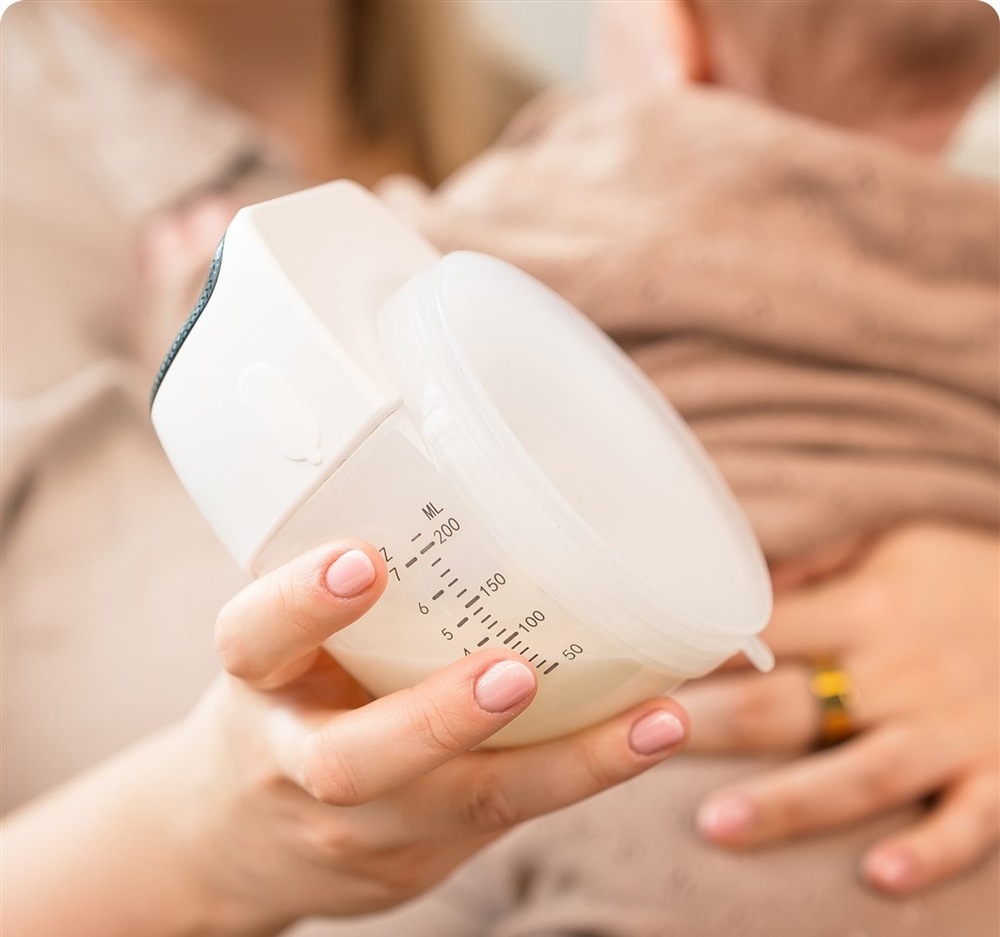 Odsávačka mateřského mléka Kidnort Amme DE-030347 se dodává s nádobou na mléko 200 ml