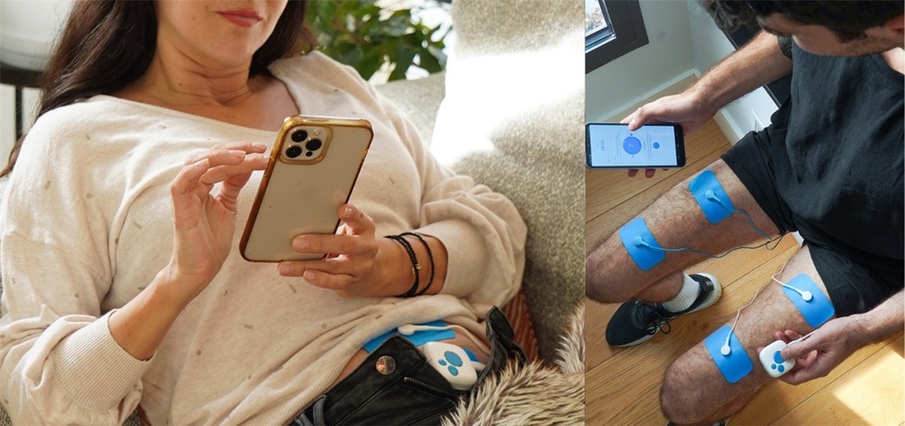 Elektrostimulátor Bluetens Classic 2 bílý Žena odpočívá na pohovce a ovládá mobilní aplikací stimulátor Bluetens Classic 2 na břiše.