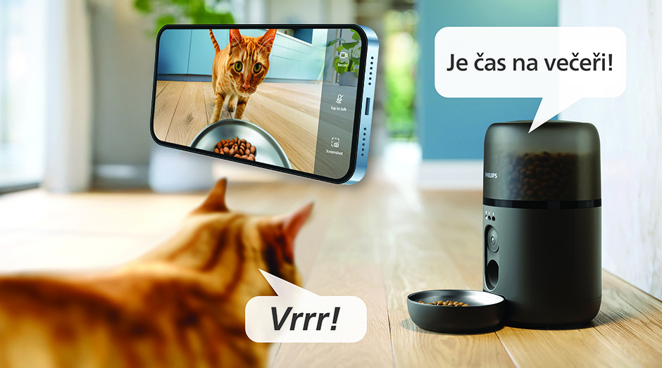 Chytré krmítko Philips, kočka a mobil s mobilní aplikací pro chytré krmítko