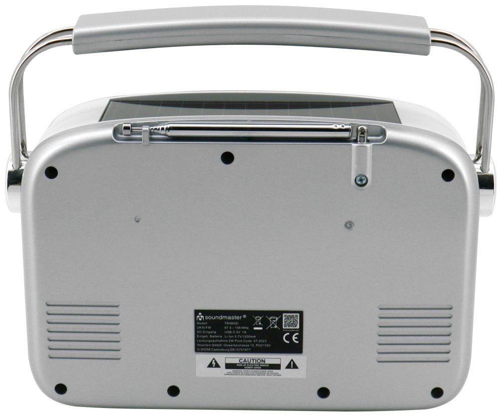 Radiopřijímač Soundmaster TR480SI stříbrný/bílý Zadní strana rádia Soundmaster TR480SI se štítkem technických parametrů a složenou anténou.