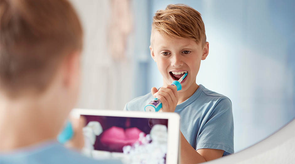 Zubní kartáček Philips Sonicare For Kids HX6322/04 bílý/zelený Philips HX6322/04 Sonicare For Kids