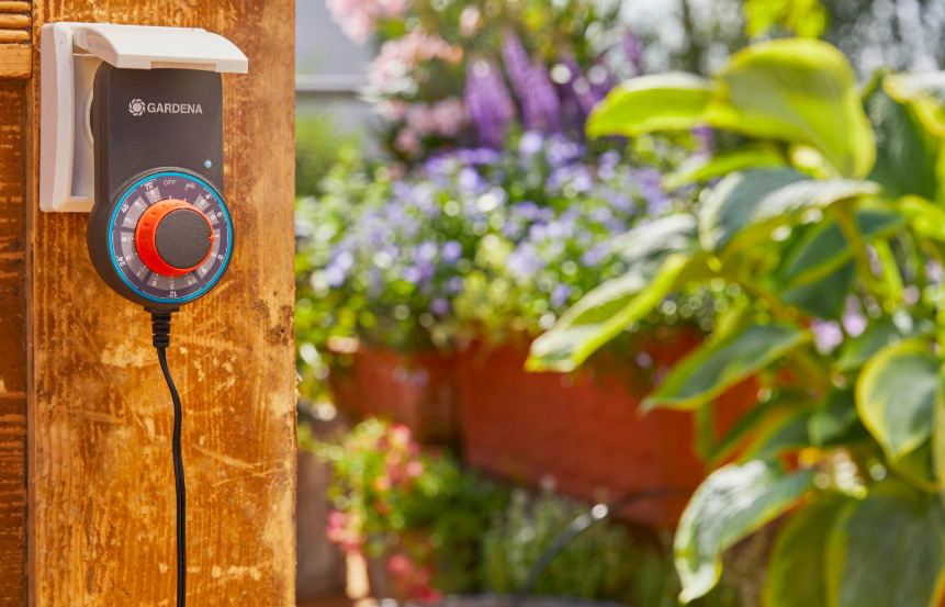 Transformátor Gardena 01407 s otočným voličem zavlažovacích programů v zásuvce