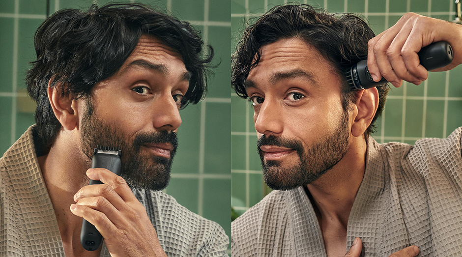 Muž zastřihující si vousy a vlasy zastřihovačem Philips MG3920/15