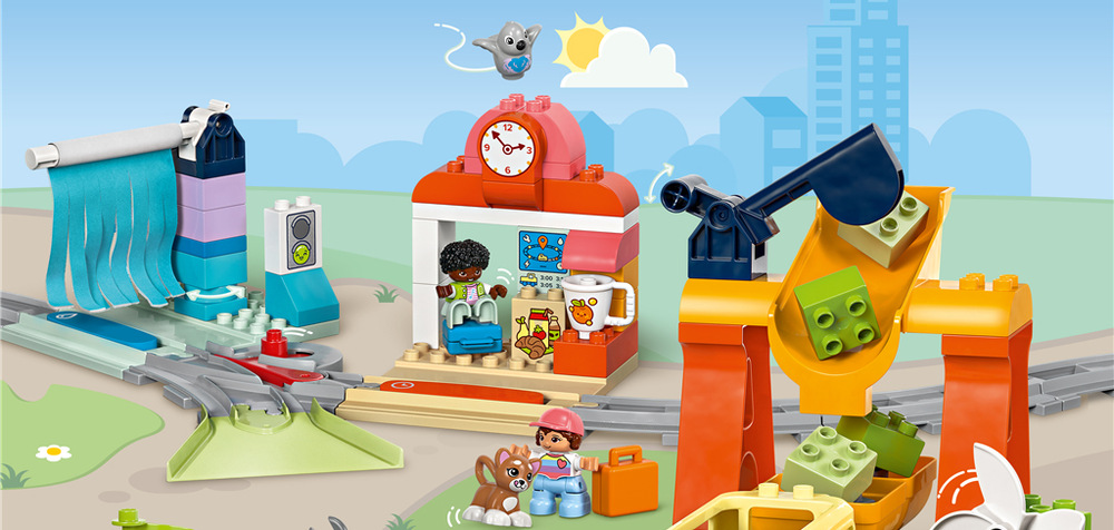 Stavebnice LEGO® DUPLO® 10428 Velký interaktivní komunitní vláček Push & Go vláček reaguje na akční kostky světelnými a zvukovými efekty a nabízí také různá stanoviště.