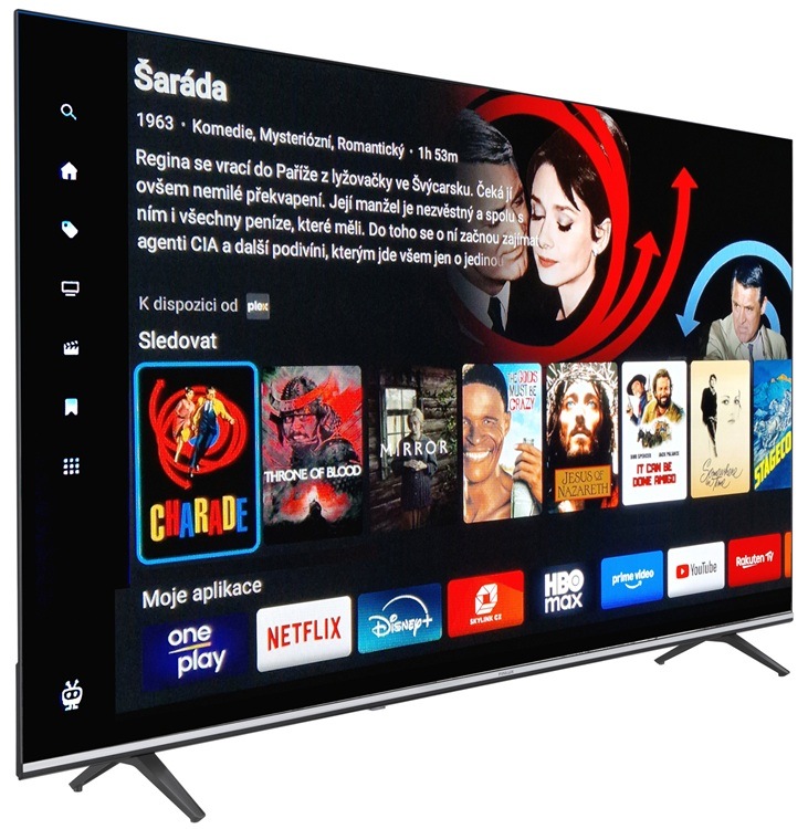 Televize Finlux 65FQK9060 natočená mírně doprava, na obrazovce televize je stránka OS TiVo