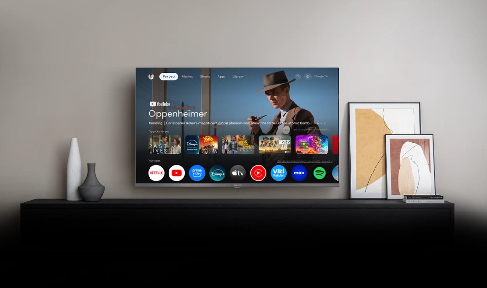 Televize Xiaomi TV A Pro 32" Televize Xiaomi TV A Pro 32" na zdi se zapnutým Google TV