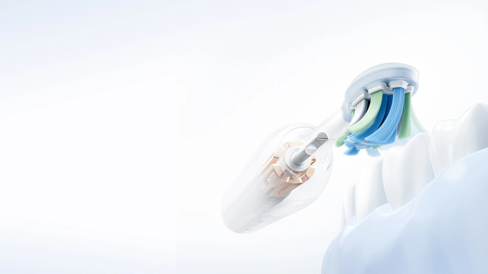 Detail hlavy elektrického zubního kartáčku Xiaomi se znázorněním vnitřního mechanismu pohonu