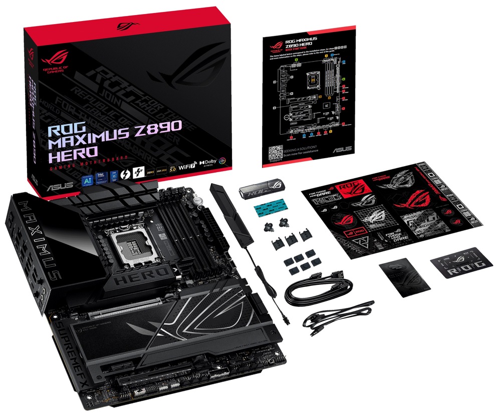 Základní deska Asus ROG MAXIMUS Z890 HERO Na fotce je nahoře vyfocená krabice s logem ROG Maximus Z890, pod ní leží samotná základní deska s masivními kryty chlazení a výrazným ROG motivem. Vpravo od desky jsou rozložené přibalené doplňky k instalaci – manuál/letáky, Wi-Fi anténa, kabeláž a drobné montážní příslušenství (například prvky pro M.2 a další ROG „drobnosti“).
