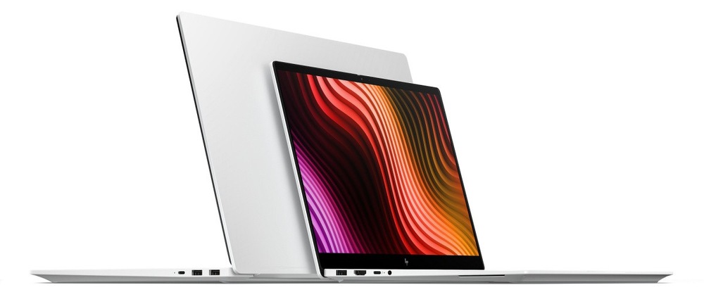 Dva otevřené notebooky HP OmniBook X AI 17 zády k sobě