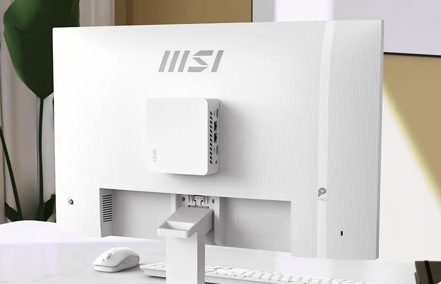 Zadní strana monitoru MSI PRO MP273W E14A s kompatibilním mini PC upevněným pomocí VESA uchycení