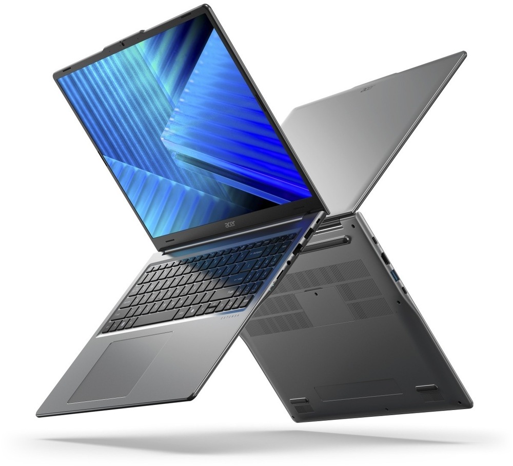 Dva otevřené notebooky Acer Extensa 16 (EXO16-71-5856) zády k sobě