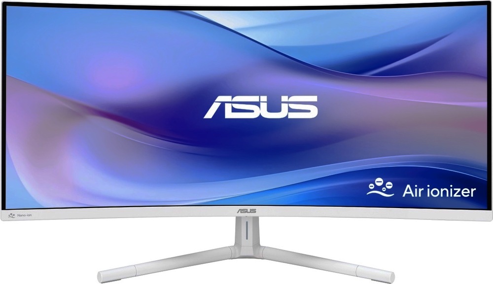 Na obrázku je monitor Asus VU34WCIP-W 34" v bílém provedení z čelního pohledu. Má širokoúhlou prohnutou obrazovku, tenké rámečky a světlou spodní lištu s logem Asus uprostřed. Monitor stojí na elegantním bílém stojanu se dvěma dlouhými šikmými nohami. Celkově působí čistě a moderně, vhodný na pracovní stůl i domácí kancelář.