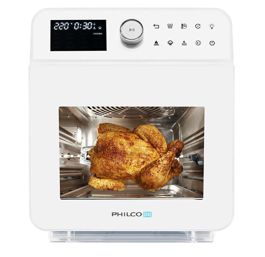 Horkovzdušná fritéza Philco PHAO 1115 W, uvnitř fritézy se griluje kuře