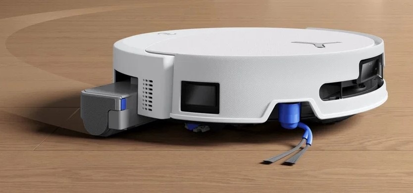 Robotický vysavač Ecovacs DEEBOT T90 MAX OMNI WHITE bílý Robotický vysavač se stanicí Ecovacs DEEBOT T90 MAX OMNI WHITE vysává a za ním je vidět i to funkce mopování.