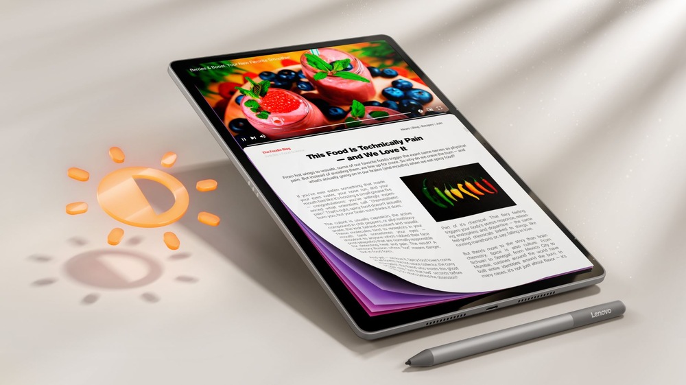 Dotykový tablet Lenovo Idea Tab Plus s dotykovým perem při práci s obsahem