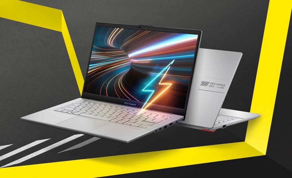 Notebook ASUS Vivobook Go 14 ve světlé barvě s grafickým motivem rychlého nabíjení na displeji