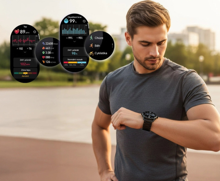 Chytré hodinky Aligator Watch AMOLED PRO stříbrné Muž sleduje hodinky na ruce.